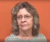 Older female dentla patient giving video review