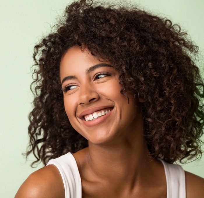 Woman with gorgeous smile after cosmetic dentistry in in York