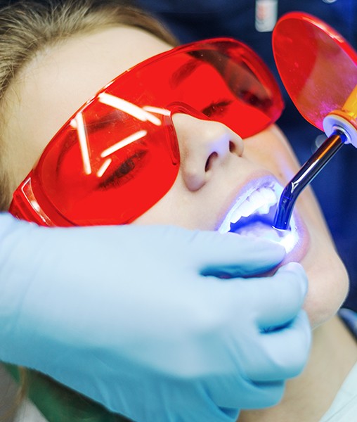 Woman receiving dental bonding