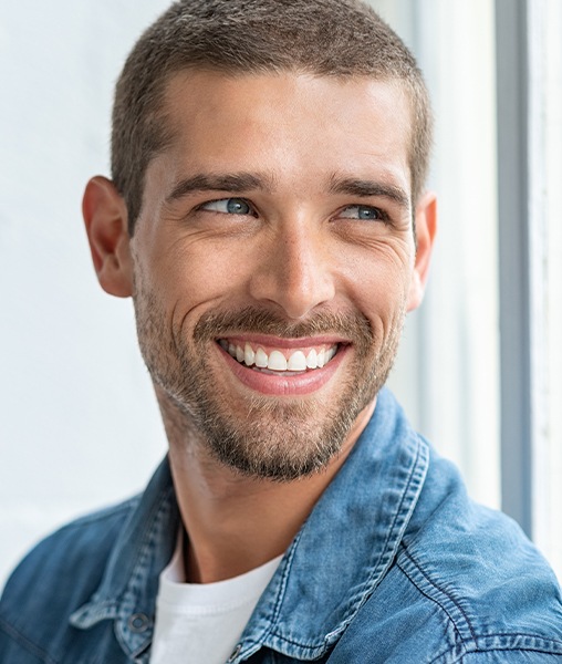 Man with bright smile after teeth whitening