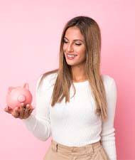 Woman enjoying the money-saving benefits of dental implants