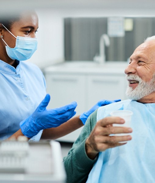 patient talking to dentist