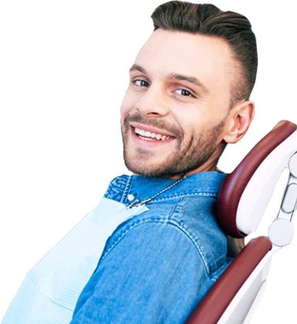 Man with straight teeth smiling at dentist’s office