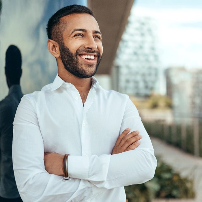 a young business professional smiling