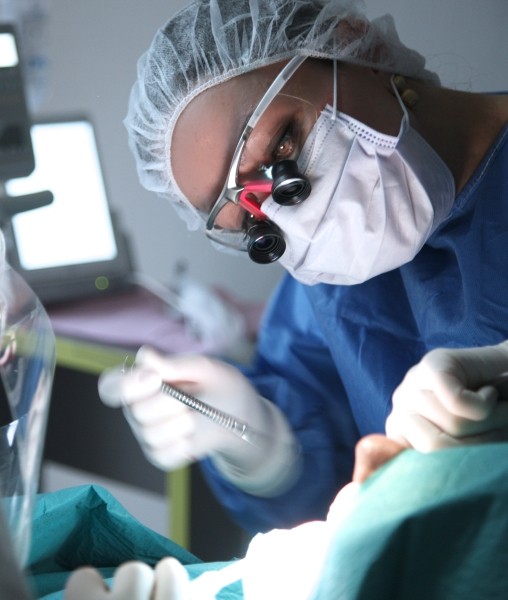 Doctor Cyriac treating dental patient