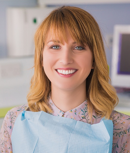 Woman in dental chair during dental checkup and teeth cleaning