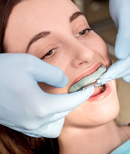 Patient receiving fluoride treatment