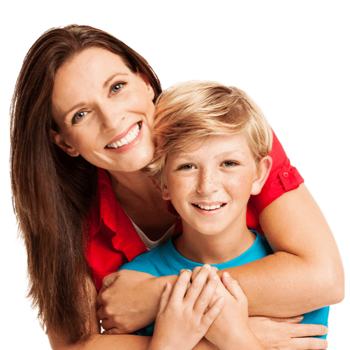 Mom and son smiling after receiving dental services