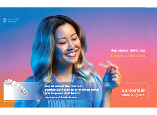 Closeup of smiling woman holding SureSmile in York