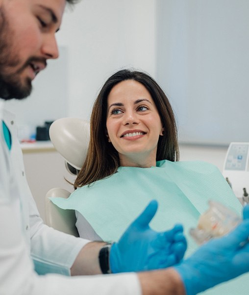 Woman smiling at the dentist